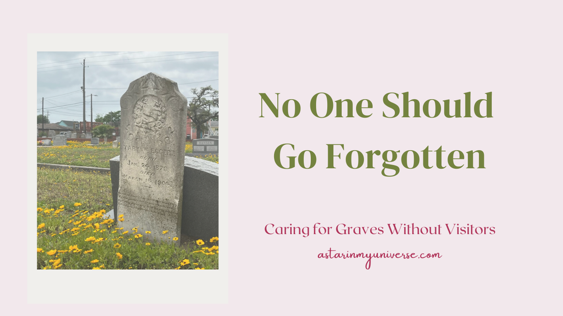 old gravestone surrounded by yellow wildflowers