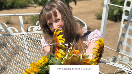 woman holding sunflowers