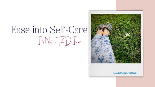 a relaxing picture of women's legs from the knees down, her feet are wearing blue deck shoes and are sitting in fresh green grass with a few spring flowers